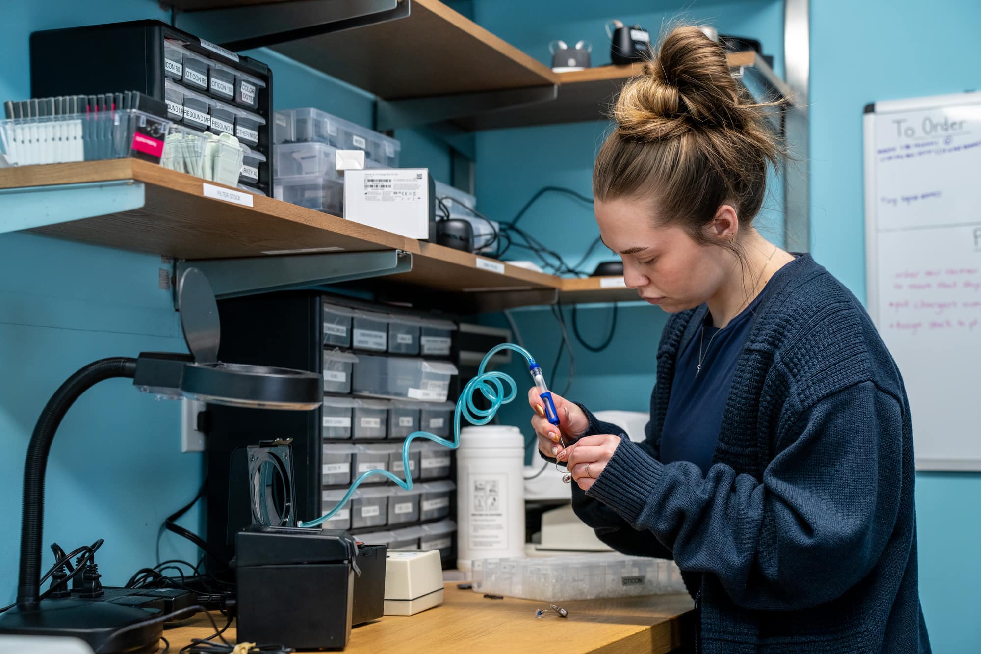 Professional hearing aid cleaning and repair at Sounds of Life Hearing Center