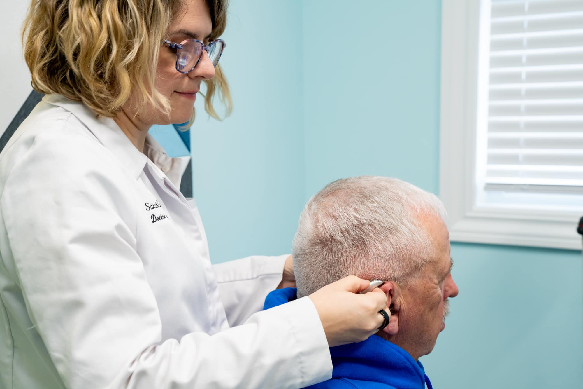 Professional hearing aid fitting at Sounds of Life Hearing Center in Concord