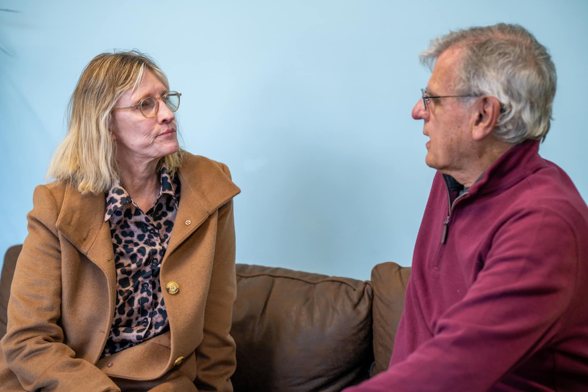 An older couple in conversation at Sounds of Life Hearing Center in Painesville, Ohio