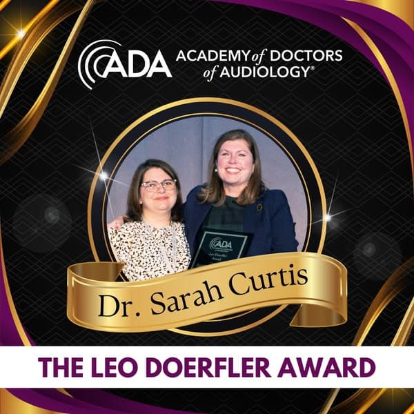 Dr. Sarah Curtis receiving the Leo Doerfler Award from the Academy of Doctors of Audiology